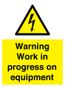 warning-work-in-progress-on-equipmentwith-electrical-hazard-symbol~